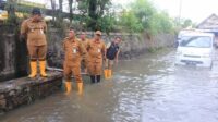 Pemkot Tangani Genangan, Ajak Warga Peduli Sampah